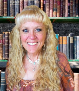 JANIE in front of books July 2014