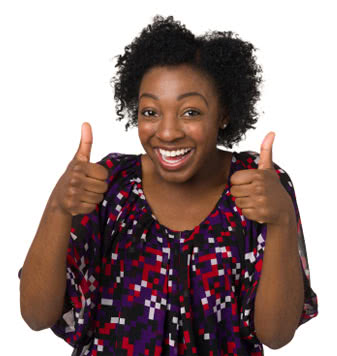 Girl giving thumbs up, smiling big